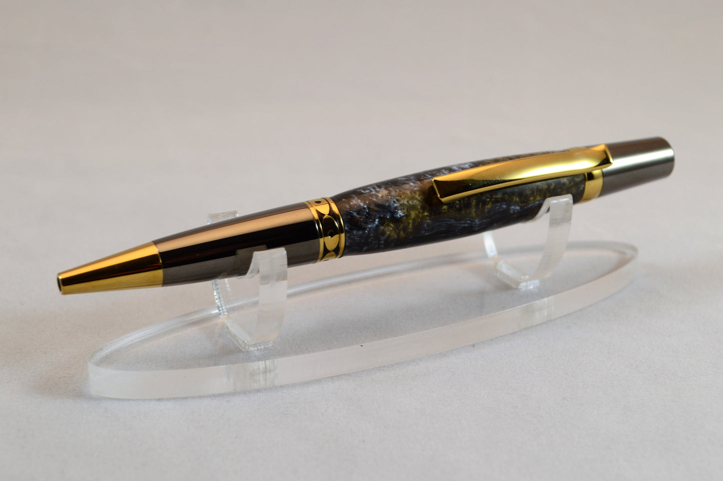 One of a Kind Twist Pen in Gold Titanium and Black Titanium with Handcrafted Acrylic Body.