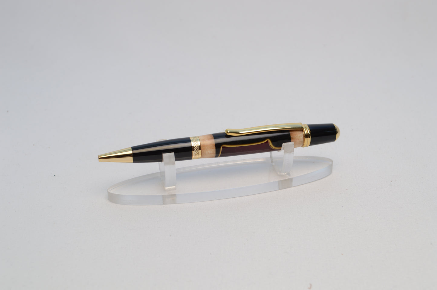 Handcrafted Pen Made With a Swatch From A Lebron James Game Used Jersey and Wood From Quicken Loans Arena Floor