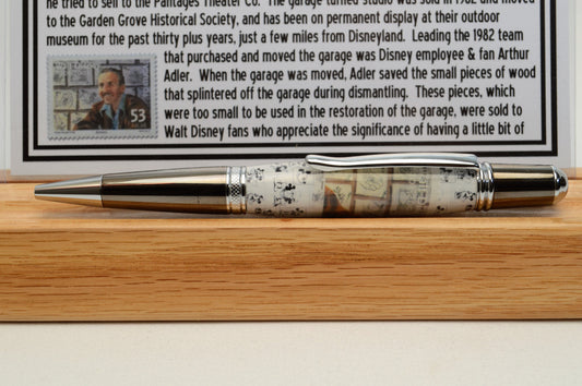 Handcrafted Pen Featuring a Walt Disney Stamp and Small Piece of Wood From Walt Disney's first garage studio in Hollywood, CA.