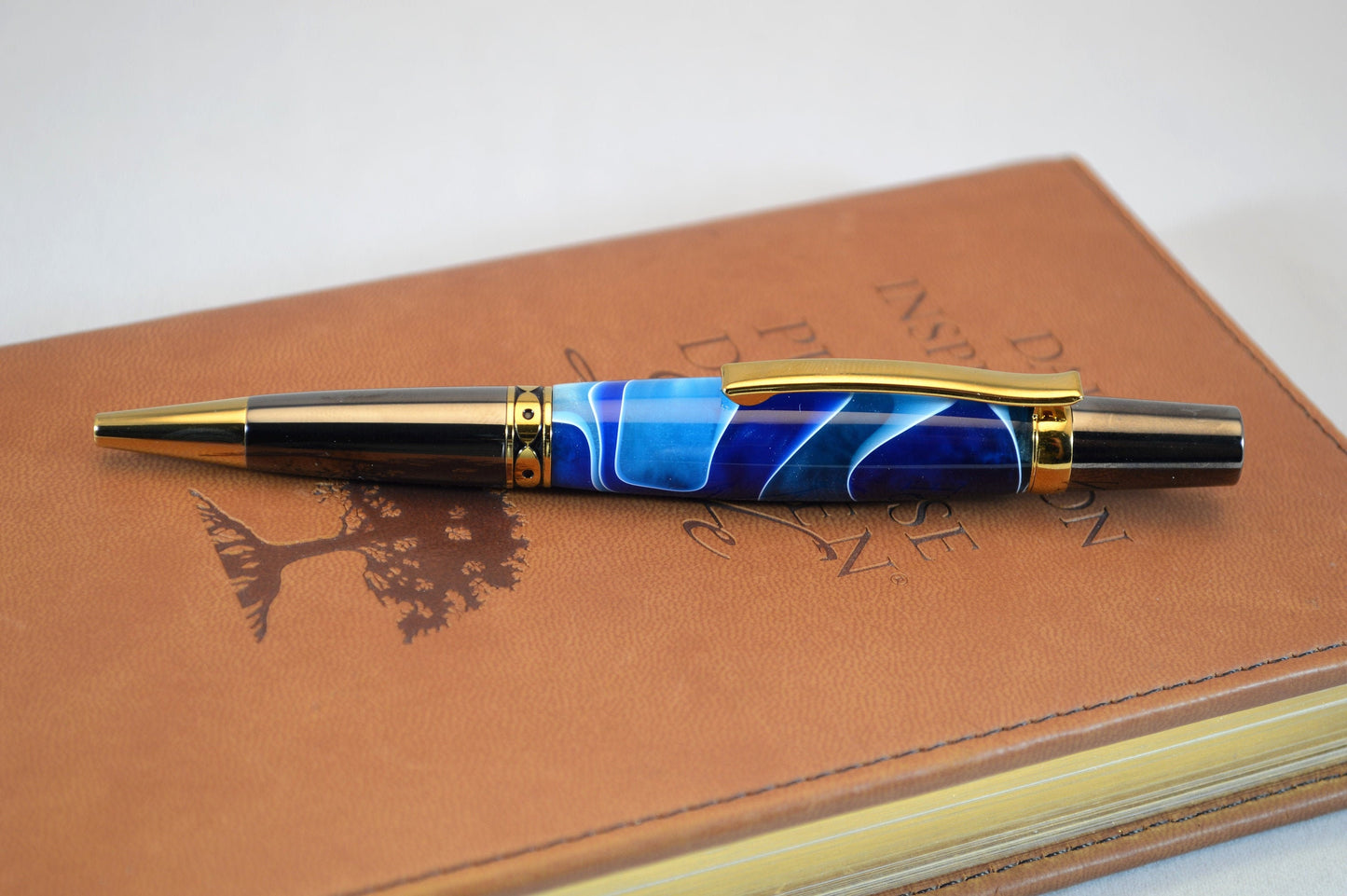 One of a Kind Classic Twist Pen in Gold Titanium and Black Titanium with Handcrafted Acrylic Body.