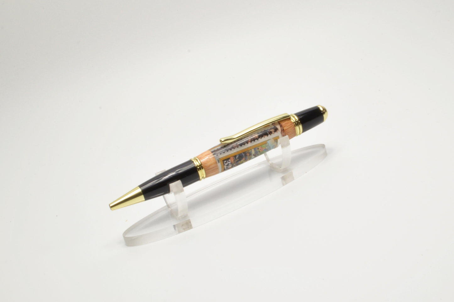 Handcrafted Gettysburg Twist Pen Made With a US Stamp Depicting The Battle of Gettysburg and Witness Wood in Gold and Black Chrome Finish