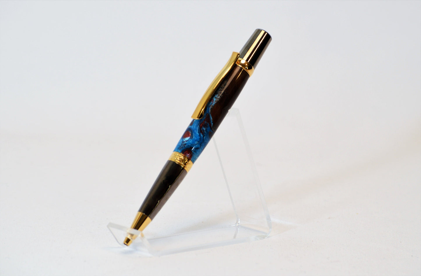 One of a Kind Elegant Twist Pen in Gold Titanium and Black Titanium with Handcrafted Acrylic and North Georgia Walnut Body.