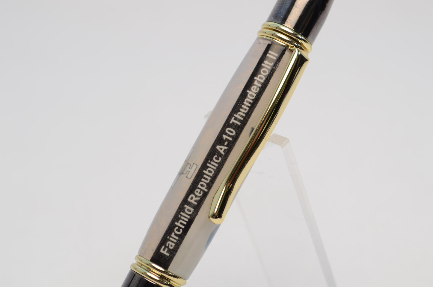 Handcrafted Twist Pen Made With a Small Piece of Aluminum From an A10 Warthog cast in acrylic.