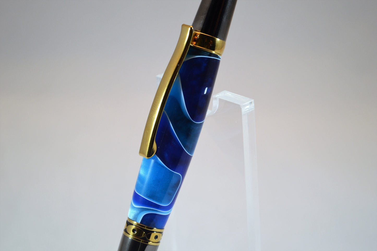 One of a Kind Classic Twist Pen in Gold Titanium and Black Titanium with Handcrafted Acrylic Body.