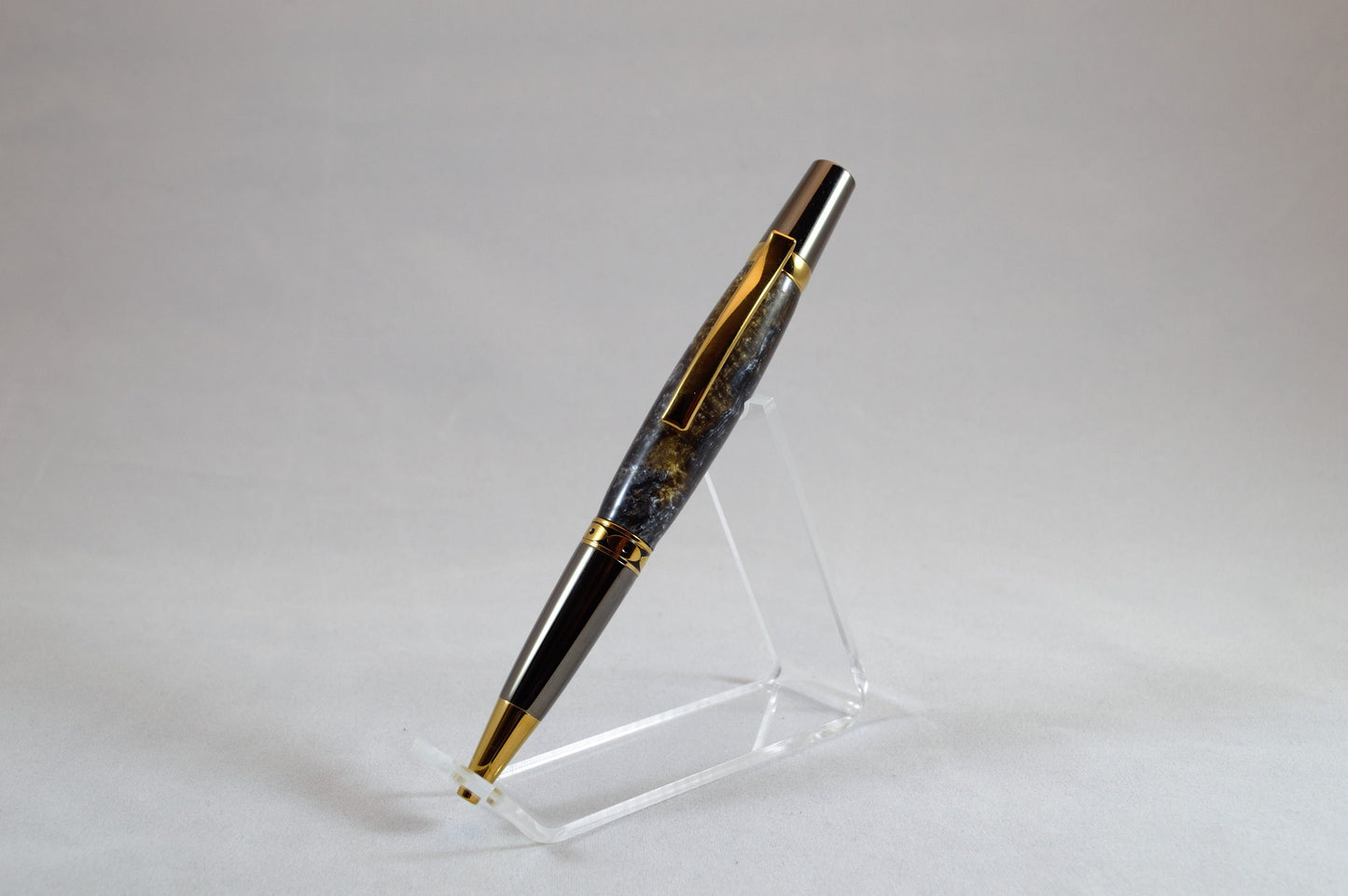 One of a Kind Twist Pen in Gold Titanium and Black Titanium with Handcrafted Acrylic Body.