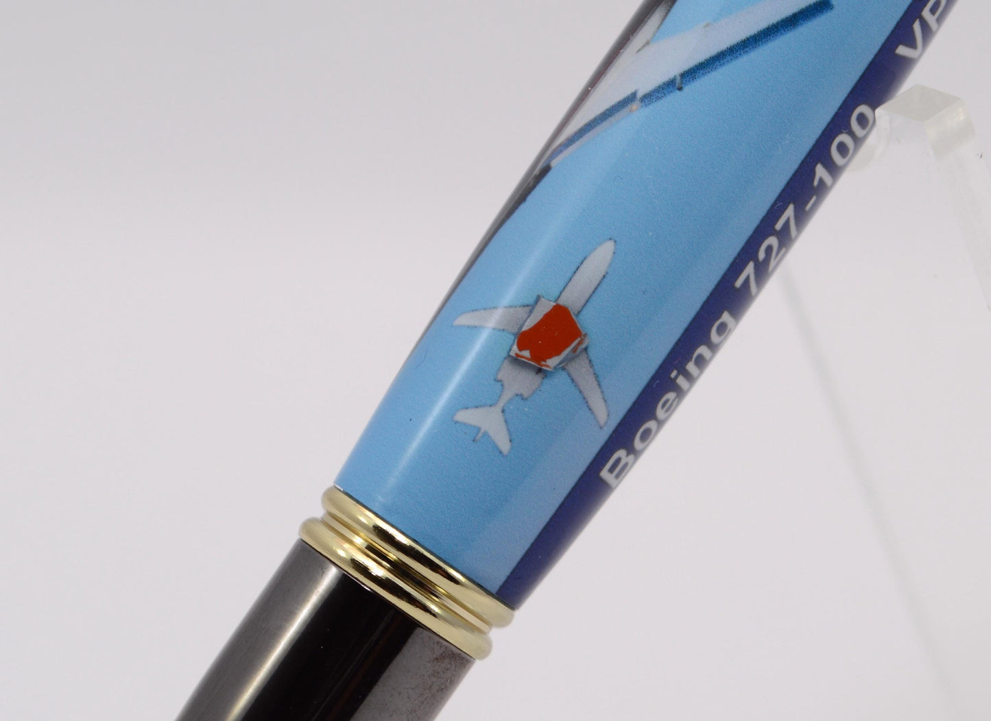 Handcrafted Pen made with a small piece of metal from Donald Trump's Boeing 727 Known as Trump Force One and cast in acrylic.