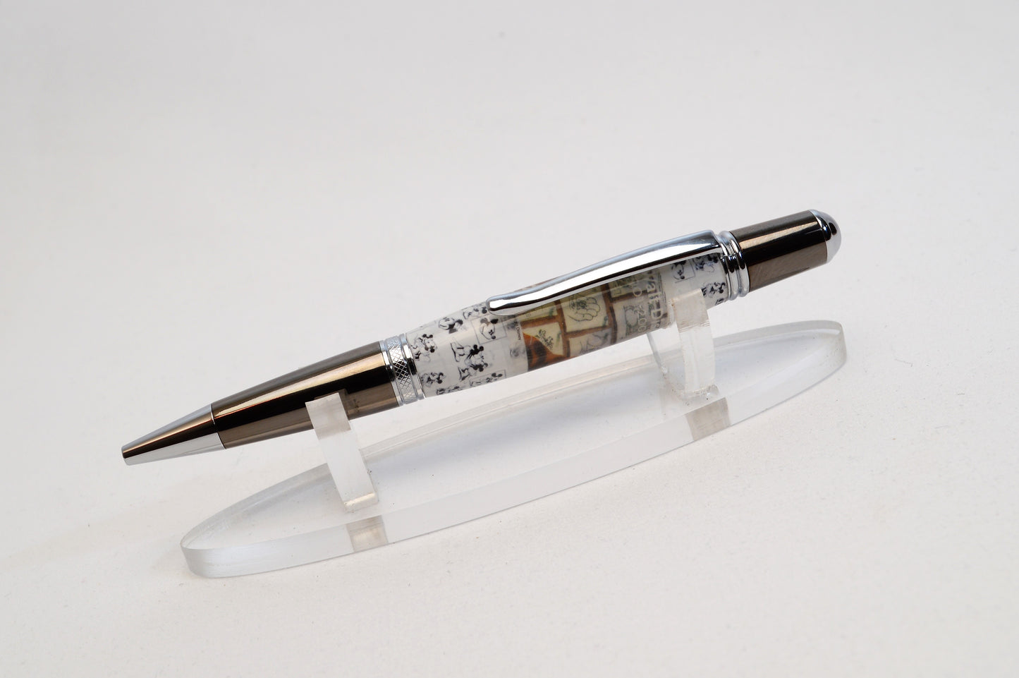 Handcrafted Pen Featuring a Walt Disney Stamp and Small Piece of Wood From Walt Disney's first garage studio in Hollywood, CA.