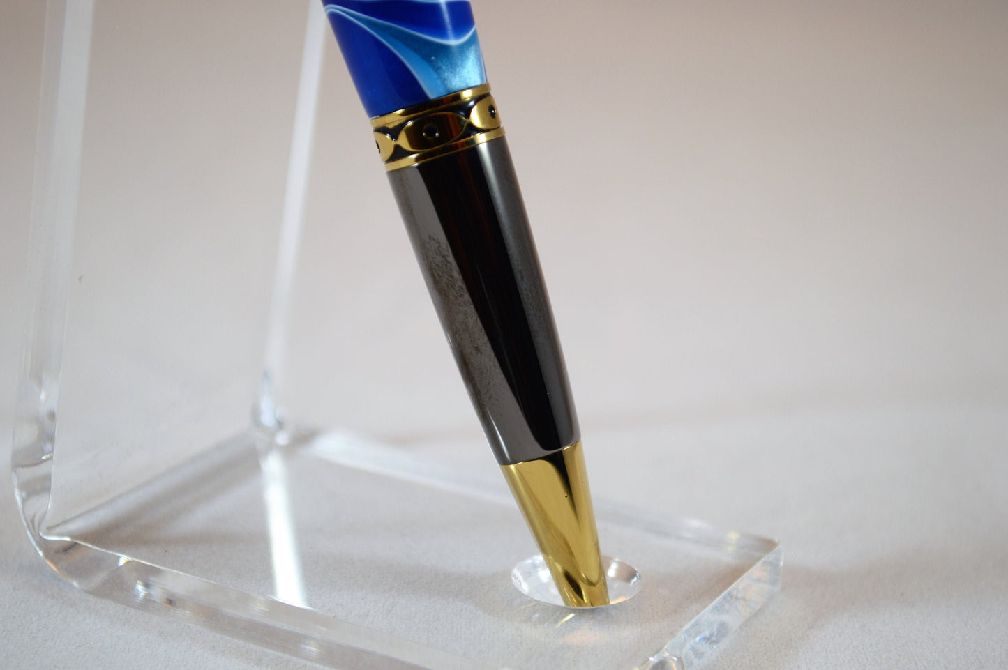 One of a Kind Classic Twist Pen in Gold Titanium and Black Titanium with Handcrafted Acrylic Body.