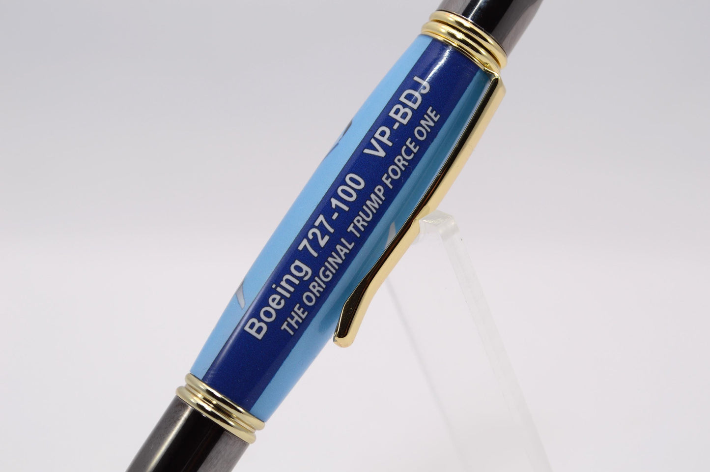 Handcrafted Pen made with a small piece of metal from Donald Trump's Boeing 727 Known as Trump Force One and cast in acrylic.