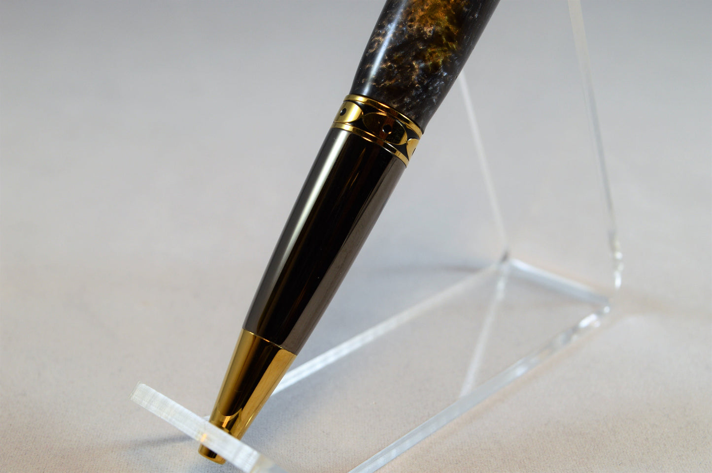 One of a Kind Twist Pen in Gold Titanium and Black Titanium with Handcrafted Acrylic Body.