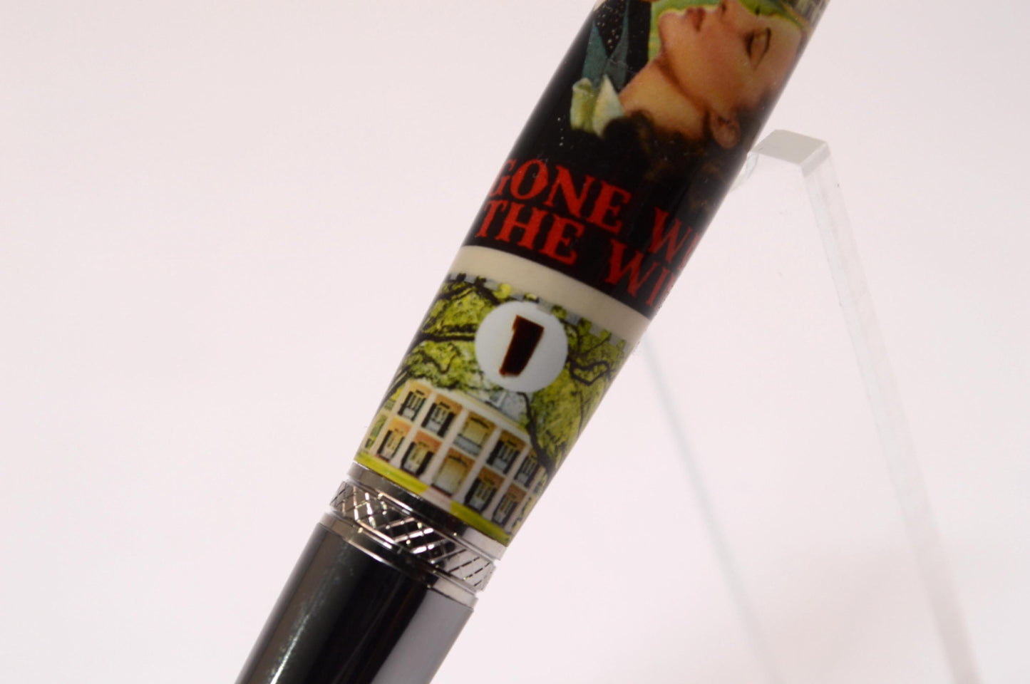 Handcrafted Pen Featuring Gone With The Wind Postage Stamp and Small Piece of Wood From Margaret Mitchell's apartment and cast in acrylic.