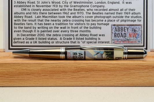 Handcrafted Pen Made with A Small Piece of Wood from Abbey Road Studios and cast in acrylic.