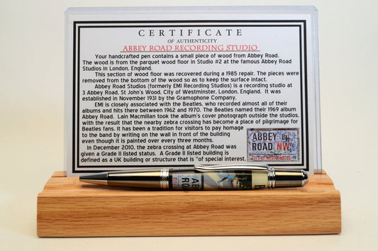 Handcrafted Pen Made with A Small Piece of Wood from Abbey Road Studios and cast in acrylic.