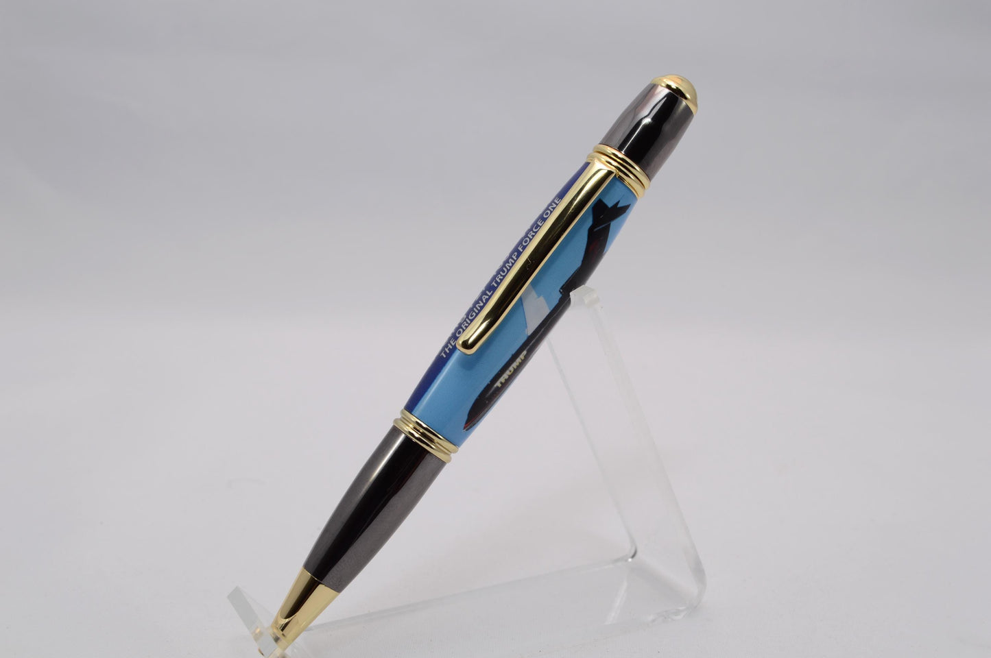 Handcrafted Pen made with a small piece of metal from Donald Trump's Boeing 727 Known as Trump Force One and cast in acrylic.