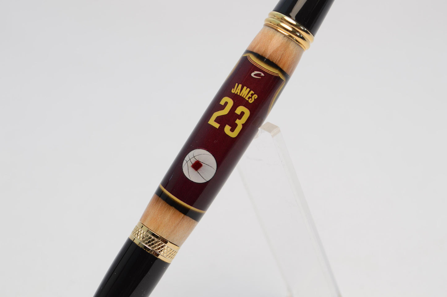 Handcrafted Pen Made With a Swatch From A Lebron James Game Used Jersey and Wood From Quicken Loans Arena Floor