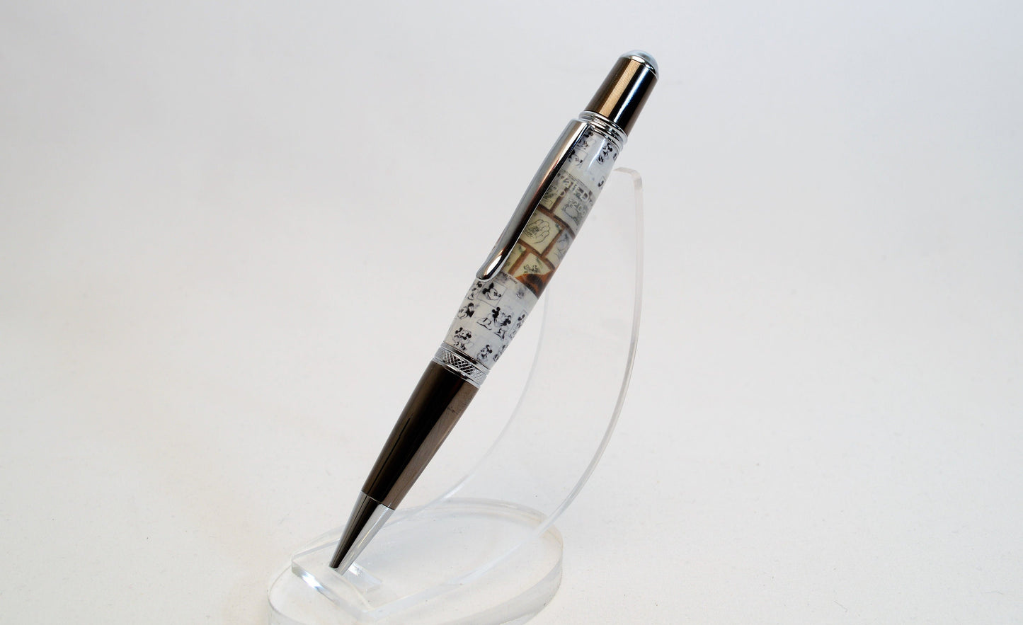 Handcrafted Pen Featuring a Walt Disney Stamp and Small Piece of Wood From Walt Disney's first garage studio in Hollywood, CA.