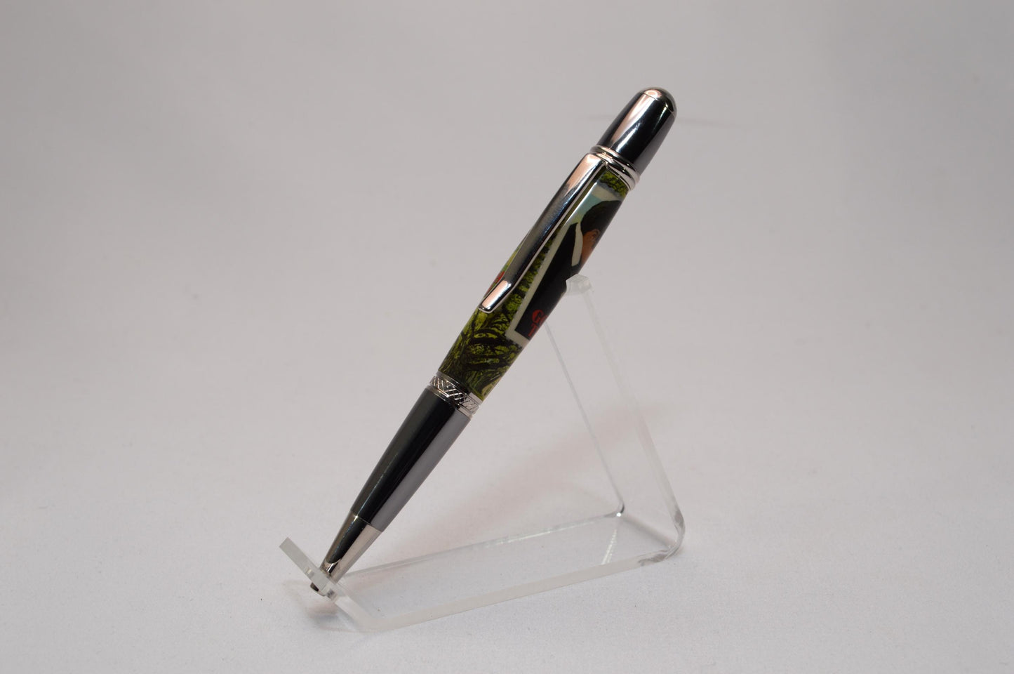 Handcrafted Pen Featuring Gone With The Wind Postage Stamp and Small Piece of Wood From Margaret Mitchell's apartment and cast in acrylic.