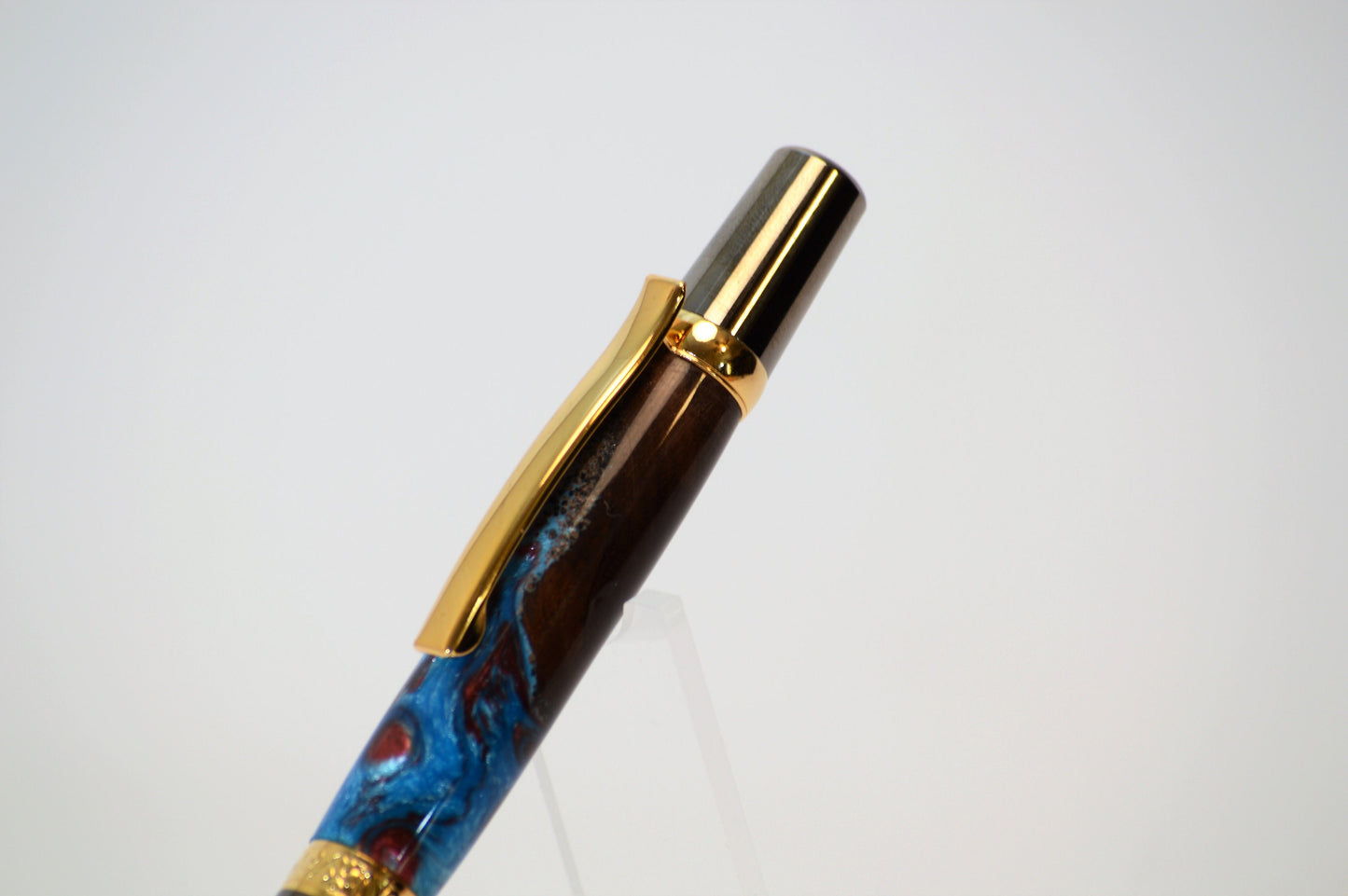 One of a Kind Elegant Twist Pen in Gold Titanium and Black Titanium with Handcrafted Acrylic and North Georgia Walnut Body.