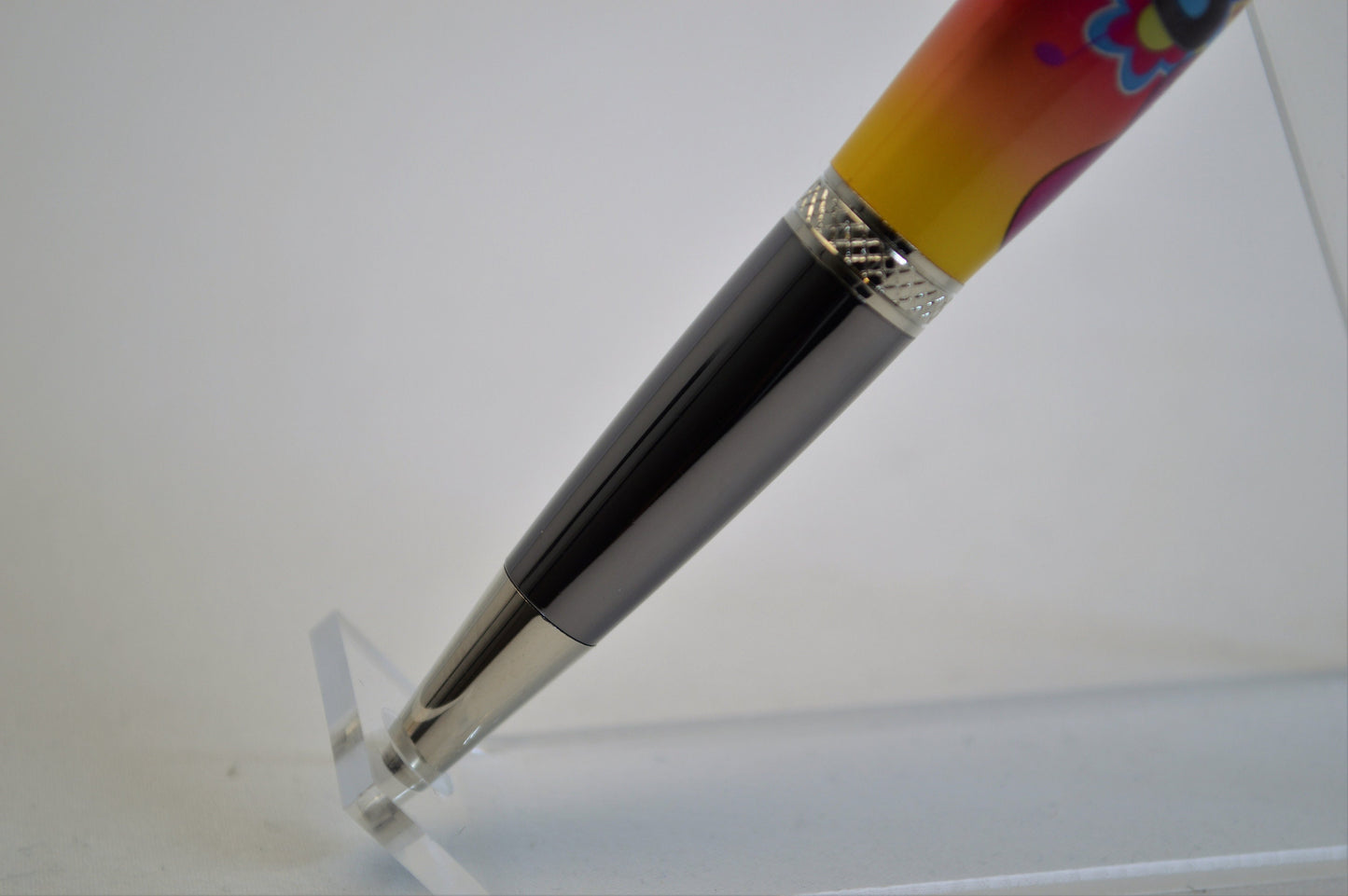 Handcrafted Pen Featuring a Small Piece of Woodstock Stage Wood and Cast in Acrylic.