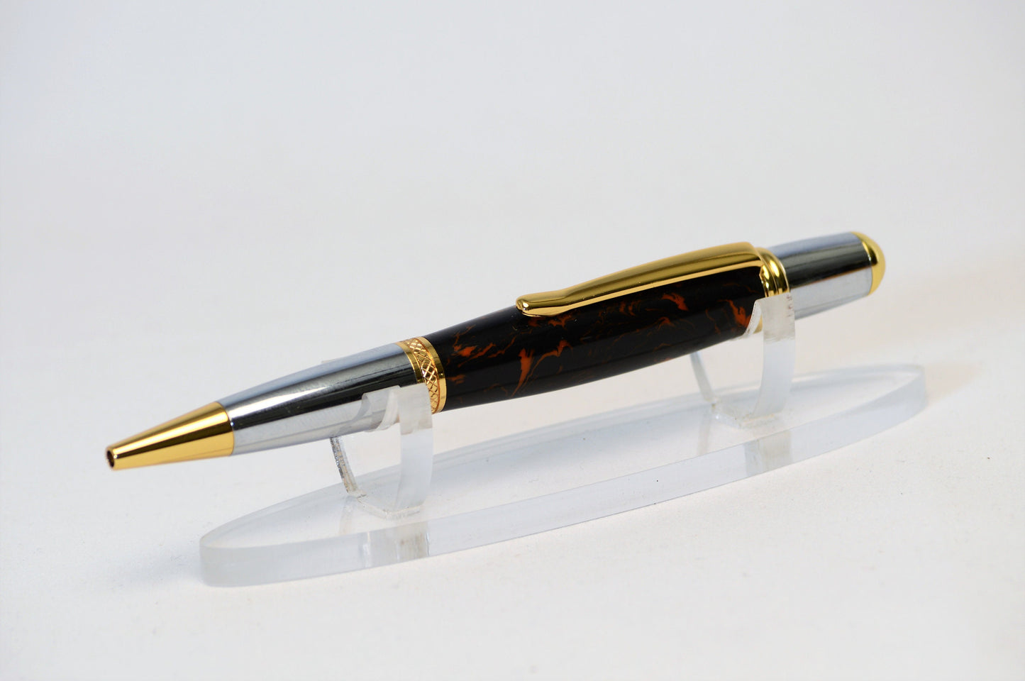 One of a Kind Classic Twist Pen in Gold Titanium and Chrome with Handcrafted Black and Orange Acrylic Body
