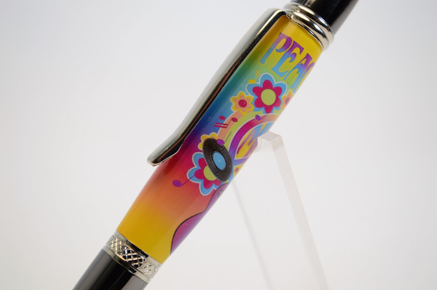 Handcrafted Pen Featuring a Small Piece of Woodstock Stage Wood and Cast in Acrylic.