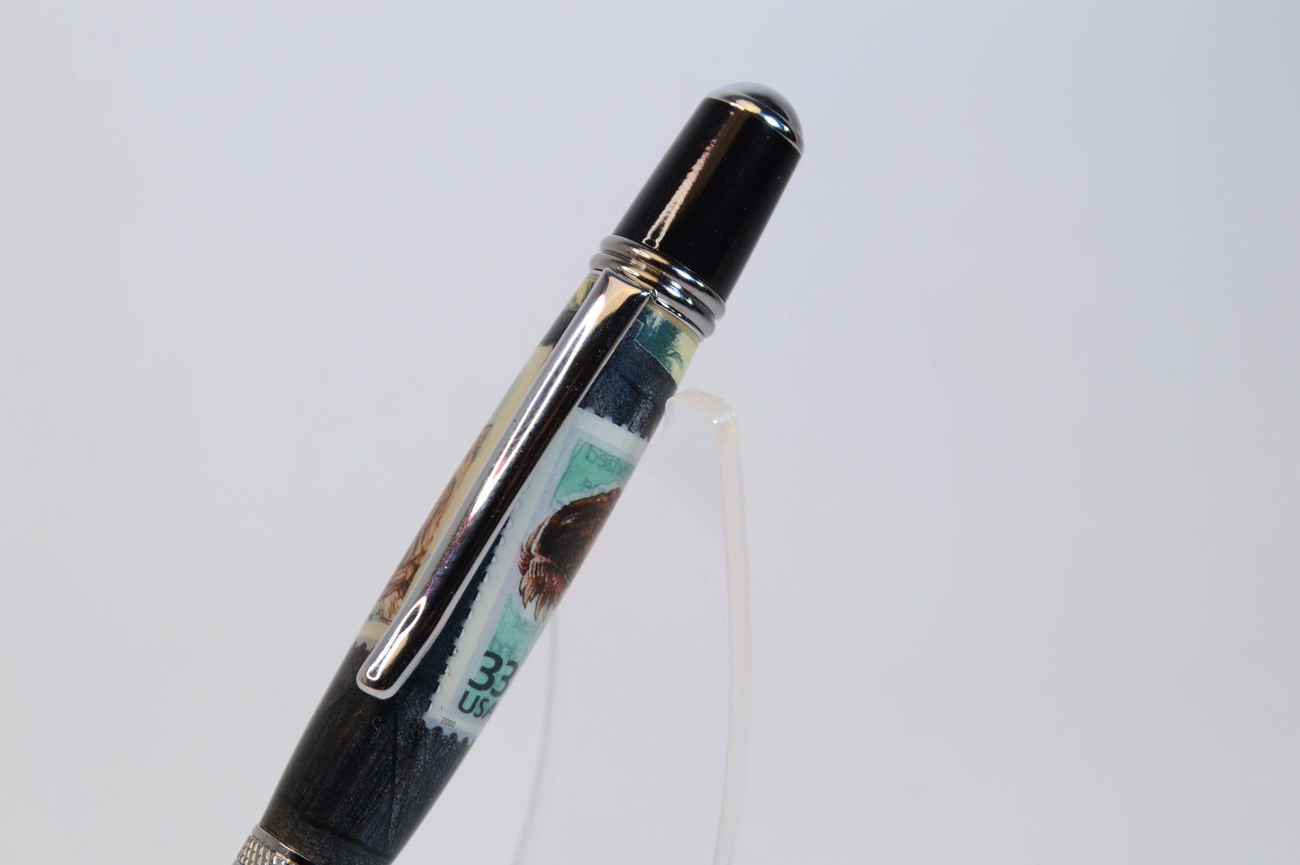 Handcrafted Pen Featuring A Jurassic Park US Postage Stamp & Movie Set Tree Wood Cast in Acrylic