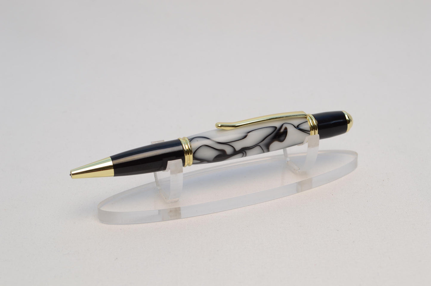 Elegant Handcrafted Twist Pen in Striking Black and White Acrylic with Gold and Black Chrome Finish