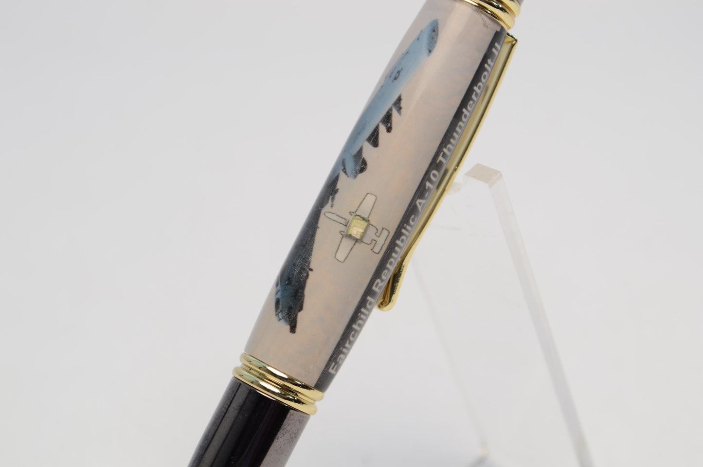 Handcrafted Twist Pen Made With a Small Piece of Aluminum From an A10 Warthog cast in acrylic.