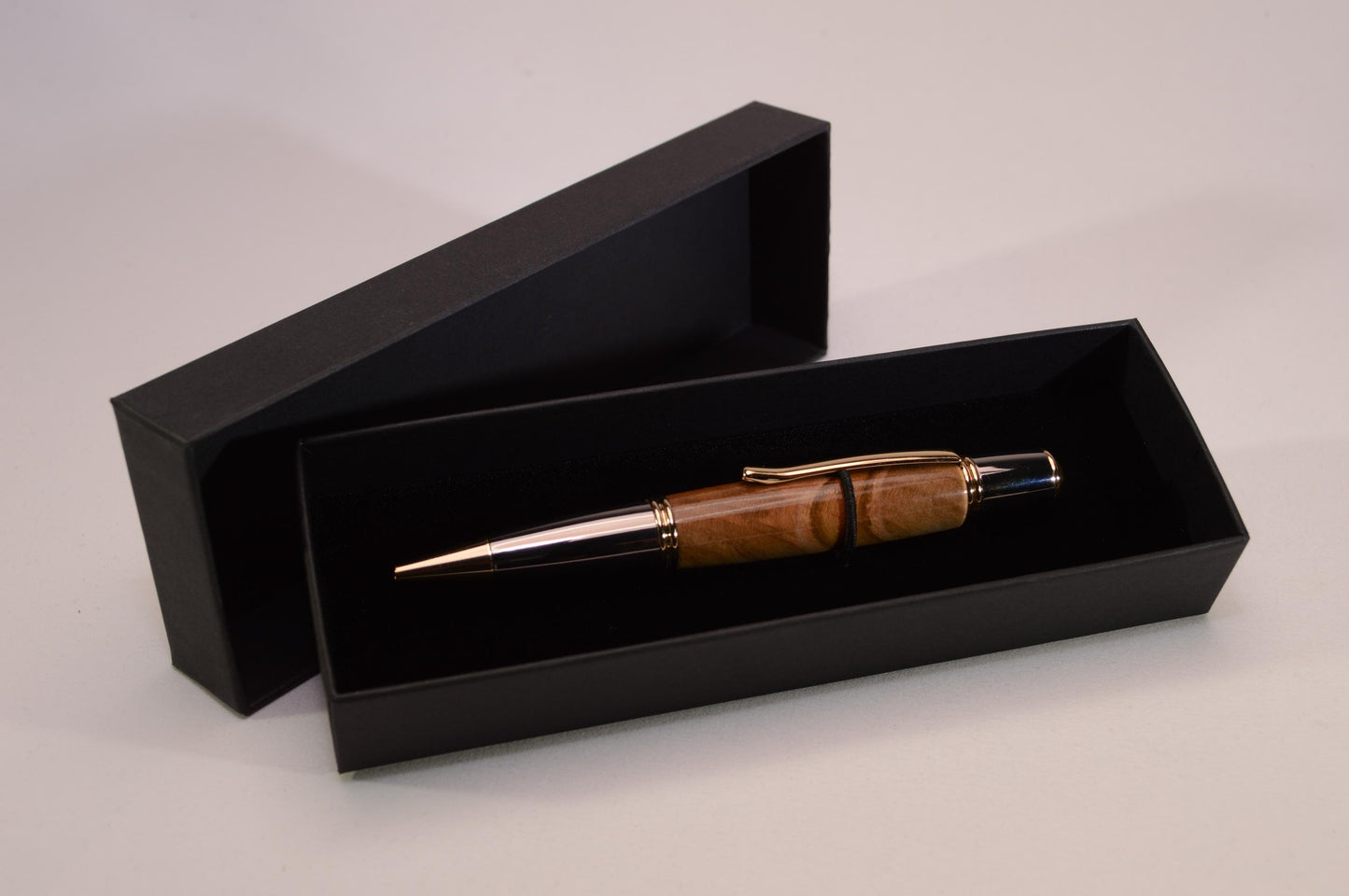 Handcrafted Spalted Maple Twist Pen with Gold and Gunmetal Finish