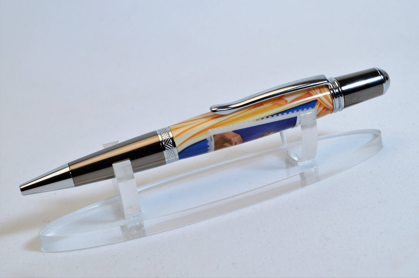 Handcrafted Pen Featuring a Marilyn Monroe US Stamp and a Small Swatch of One of Marilyn Monroe's White Gloves Cast In Acrylic