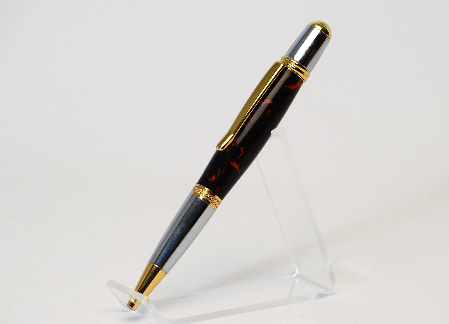 One of a Kind Classic Twist Pen in Gold Titanium and Chrome with Handcrafted Black and Orange Acrylic Body