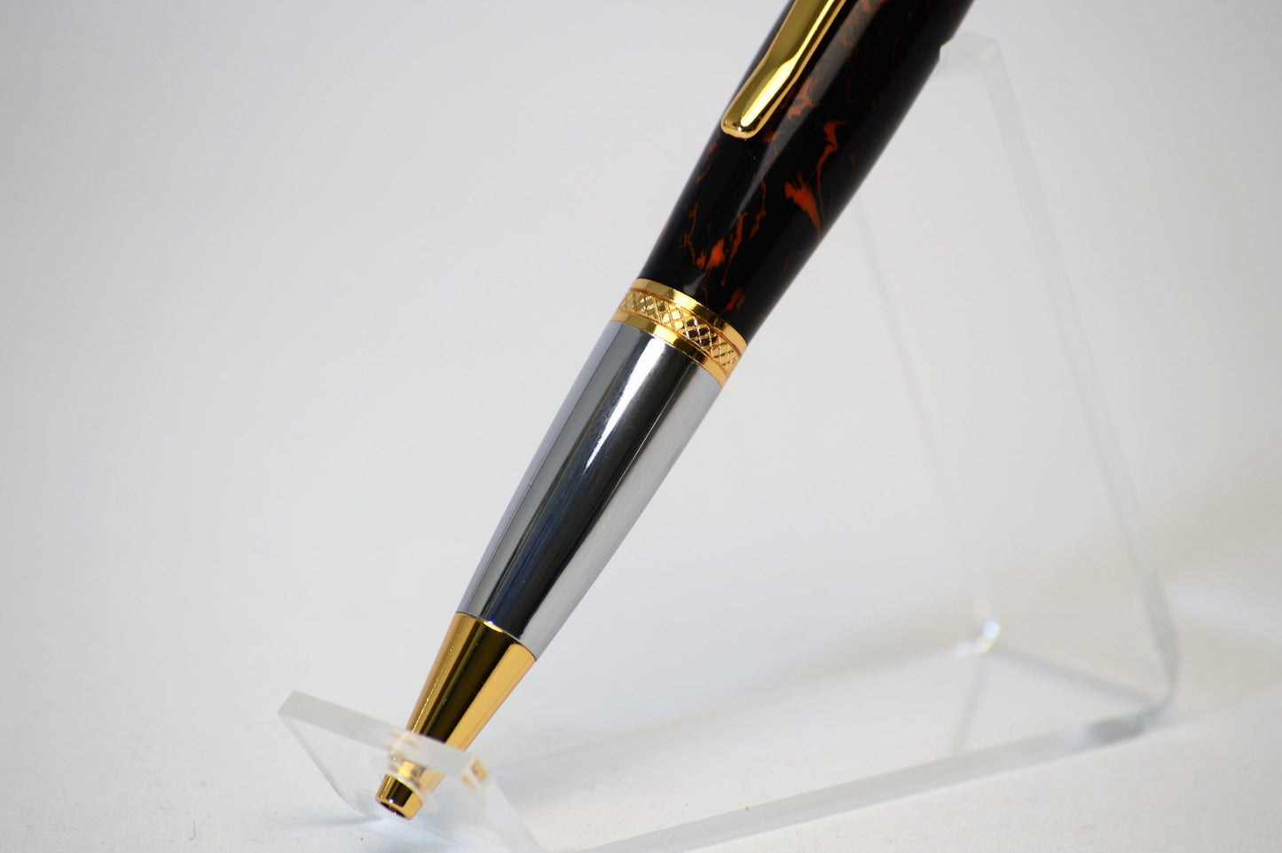 One of a Kind Classic Twist Pen in Gold Titanium and Chrome with Handcrafted Black and Orange Acrylic Body