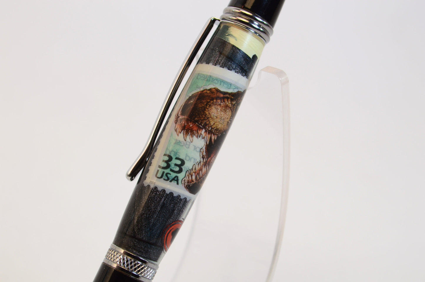 Handcrafted Pen Featuring A Jurassic Park US Postage Stamp & Movie Set Tree Wood Cast in Acrylic