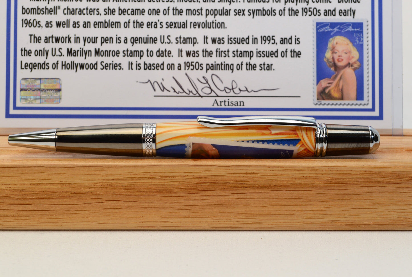 Handcrafted Pen Featuring a Marilyn Monroe US Stamp and a Small Swatch of One of Marilyn Monroe's White Gloves Cast In Acrylic