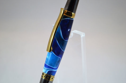 One of a Kind Classic Twist Pen in Gold Titanium and Black Titanium with Handcrafted Acrylic Body.