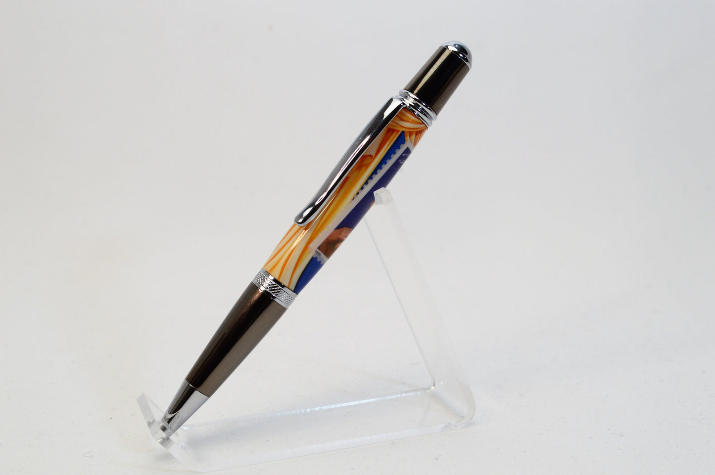 Handcrafted Pen Featuring a Marilyn Monroe US Stamp and a Small Swatch of One of Marilyn Monroe's White Gloves Cast In Acrylic