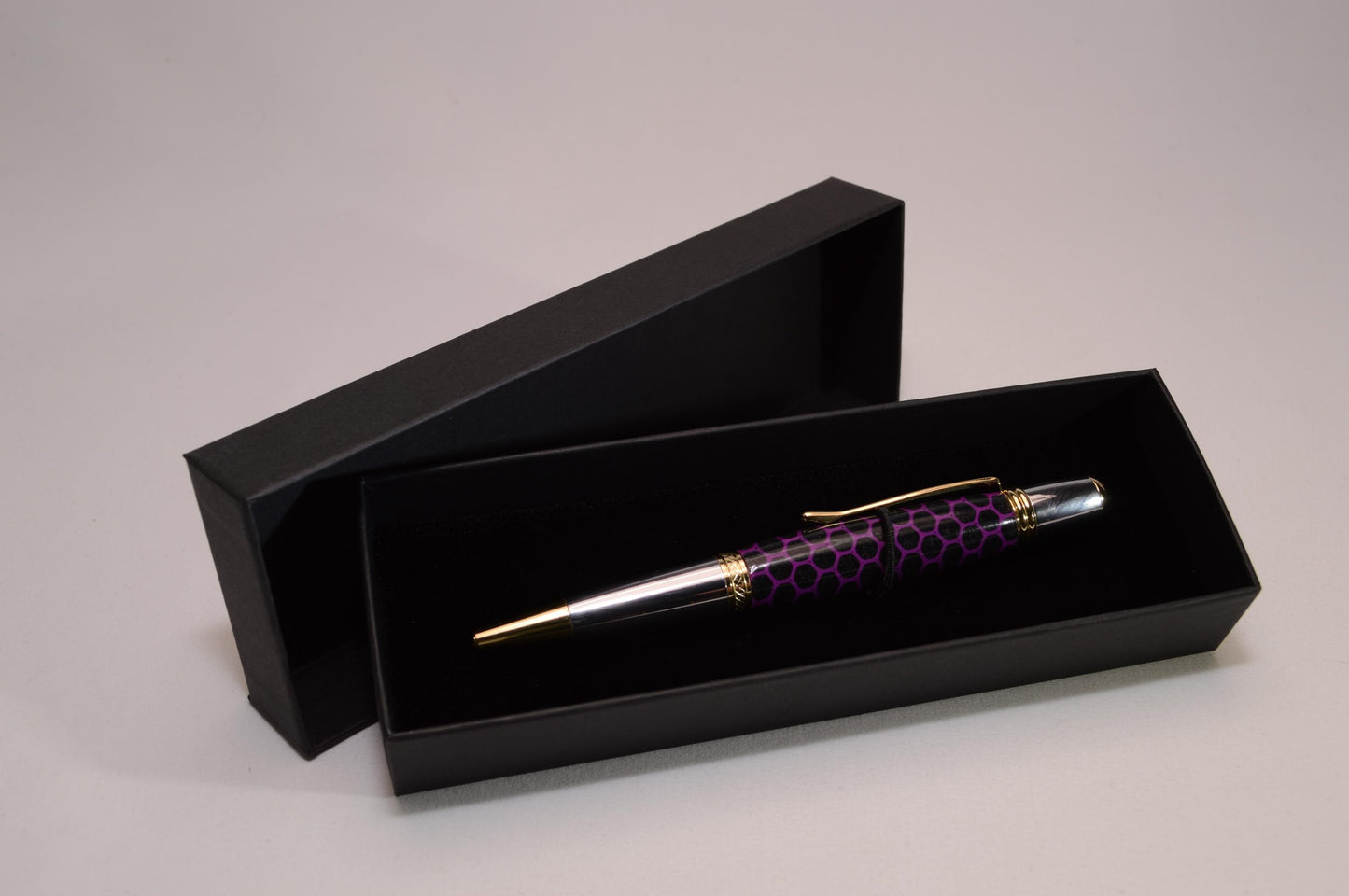 Elegant Handcrafted Twist Pen in Striking Purple and Black Honeycomb Acrylic with Gold and Chrome Finish