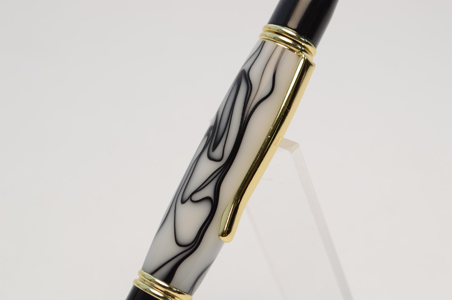 Elegant Handcrafted Twist Pen in Striking Black and White Acrylic with Gold and Black Chrome Finish