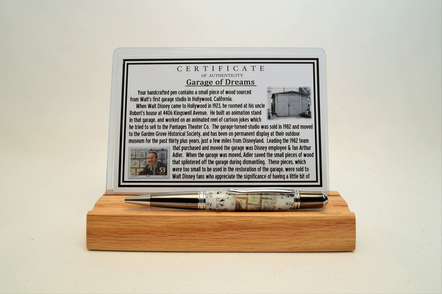 Handcrafted Pen Featuring a Walt Disney Stamp and Small Piece of Wood From Walt Disney's first garage studio in Hollywood, CA.