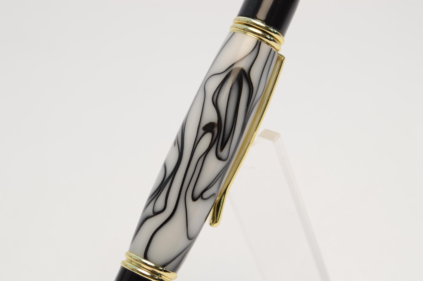 Elegant Handcrafted Twist Pen in Striking Black and White Acrylic with Gold and Black Chrome Finish