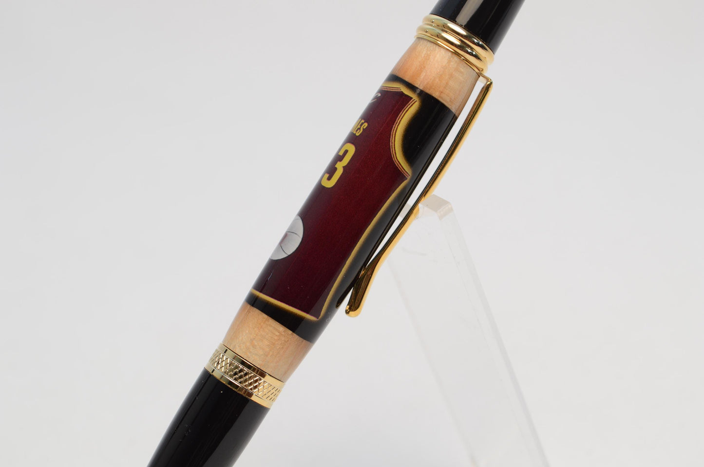 Handcrafted Pen Made With a Swatch From A Lebron James Game Used Jersey and Wood From Quicken Loans Arena Floor