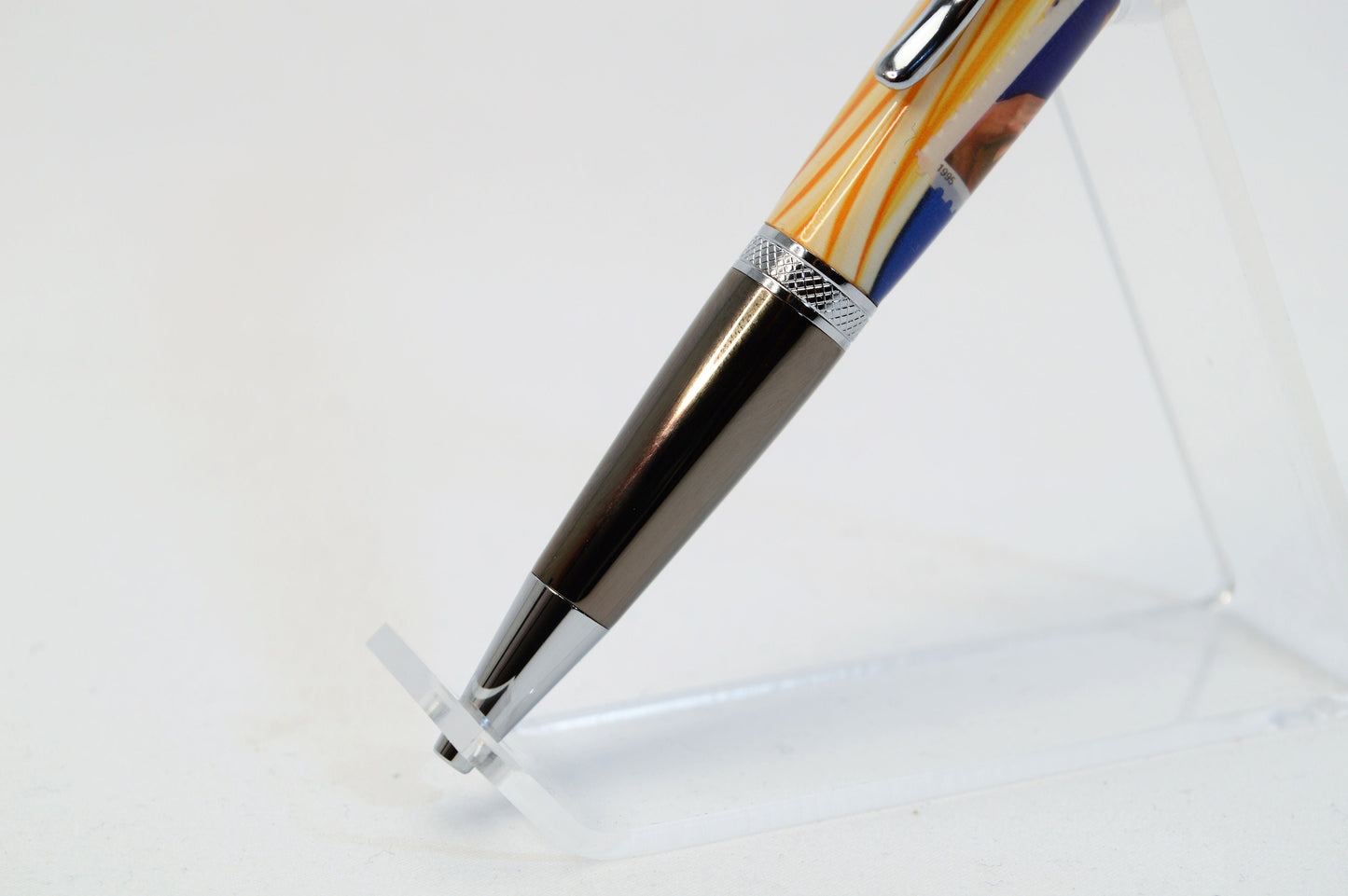 Handcrafted Pen Featuring a Marilyn Monroe US Stamp and a Small Swatch of One of Marilyn Monroe's White Gloves Cast In Acrylic