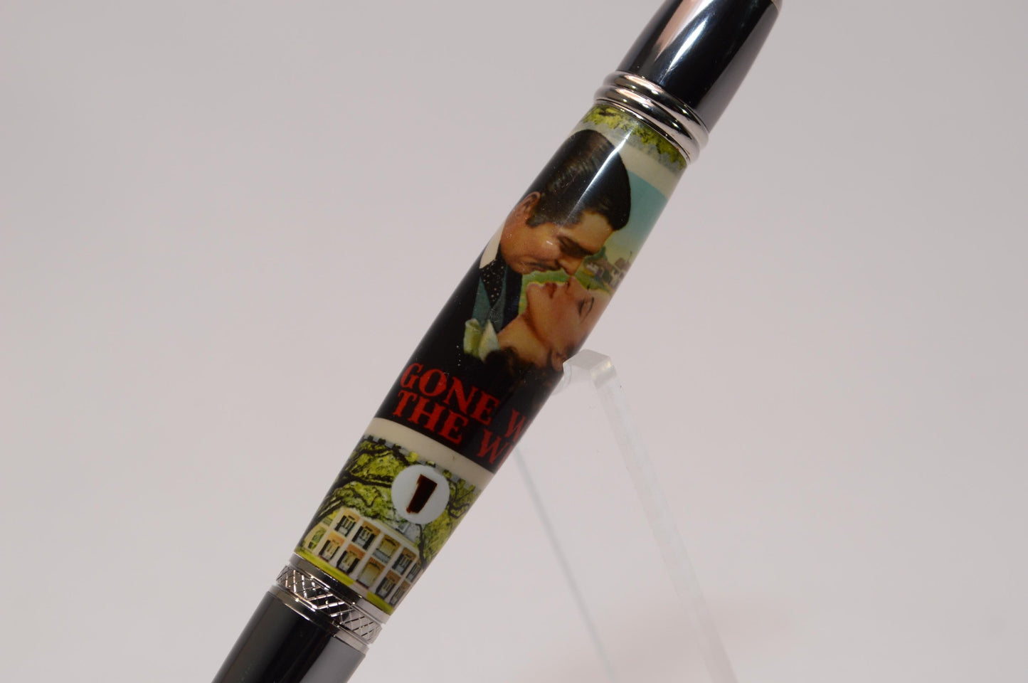 Handcrafted Pen Featuring Gone With The Wind Postage Stamp and Small Piece of Wood From Margaret Mitchell's apartment and cast in acrylic.