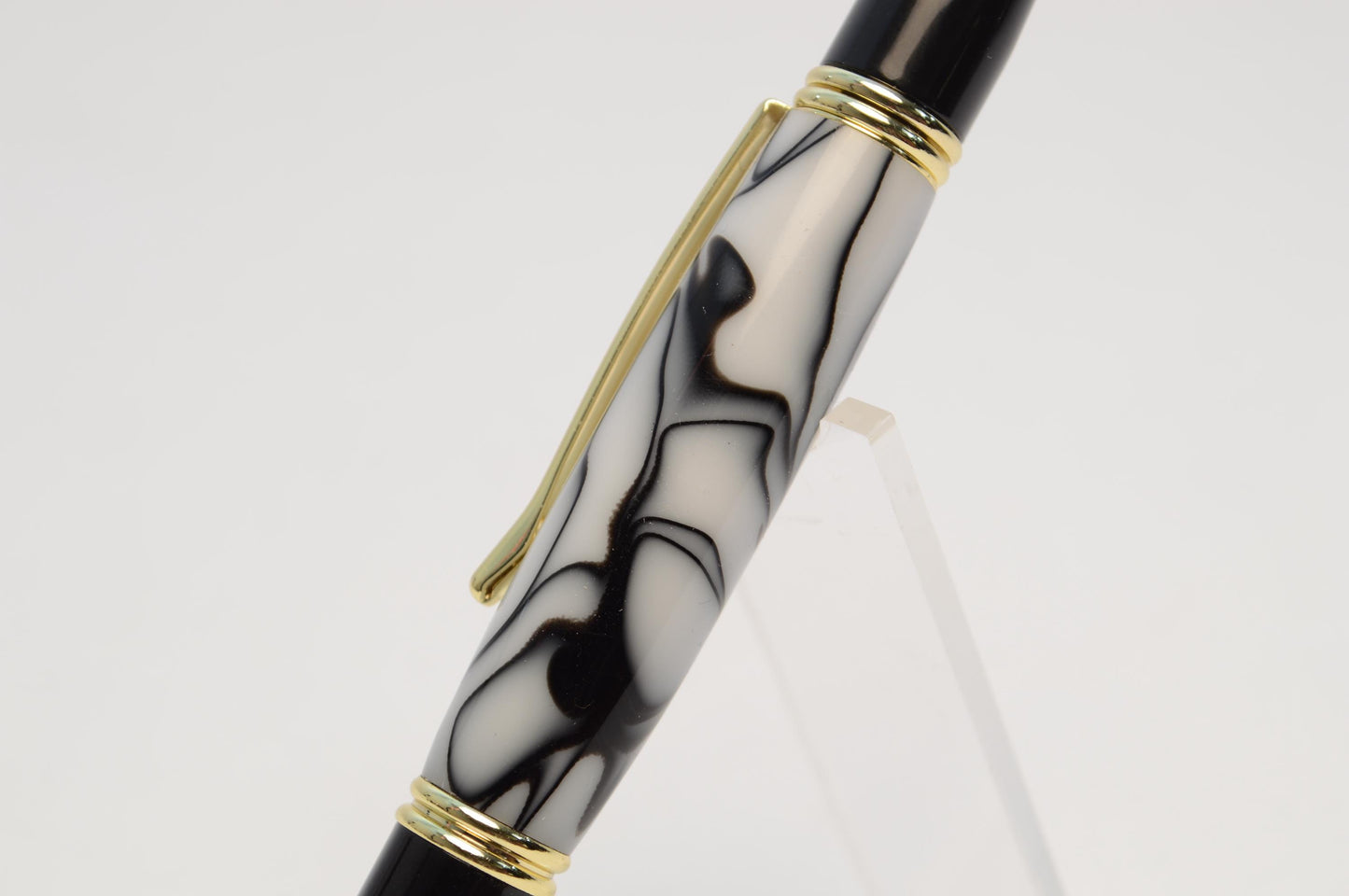 Elegant Handcrafted Twist Pen in Striking Black and White Acrylic with Gold and Black Chrome Finish