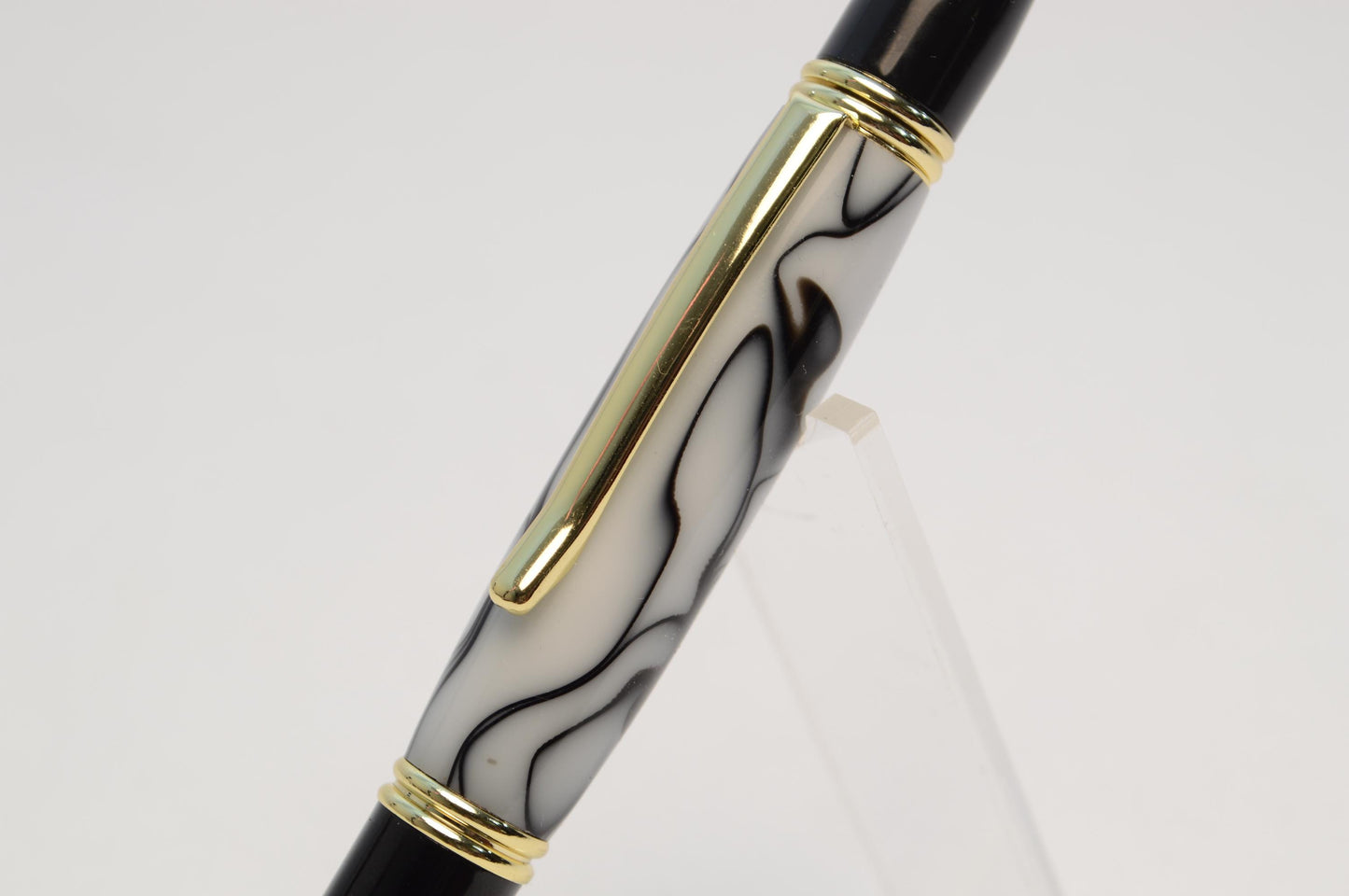 Elegant Handcrafted Twist Pen in Striking Black and White Acrylic with Gold and Black Chrome Finish