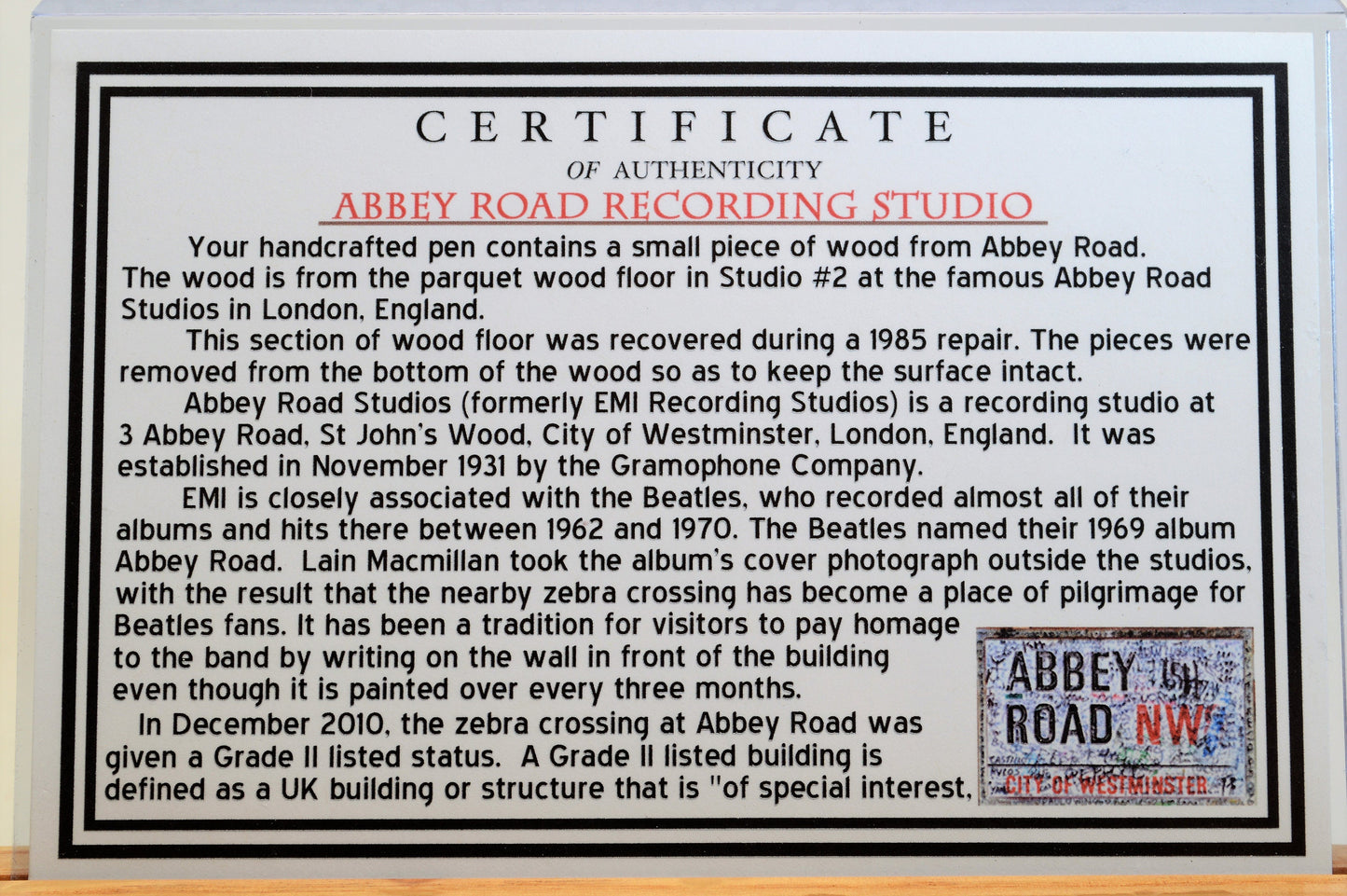 Handcrafted Pen Made with A Small Piece of Wood from Abbey Road Studios and cast in acrylic.