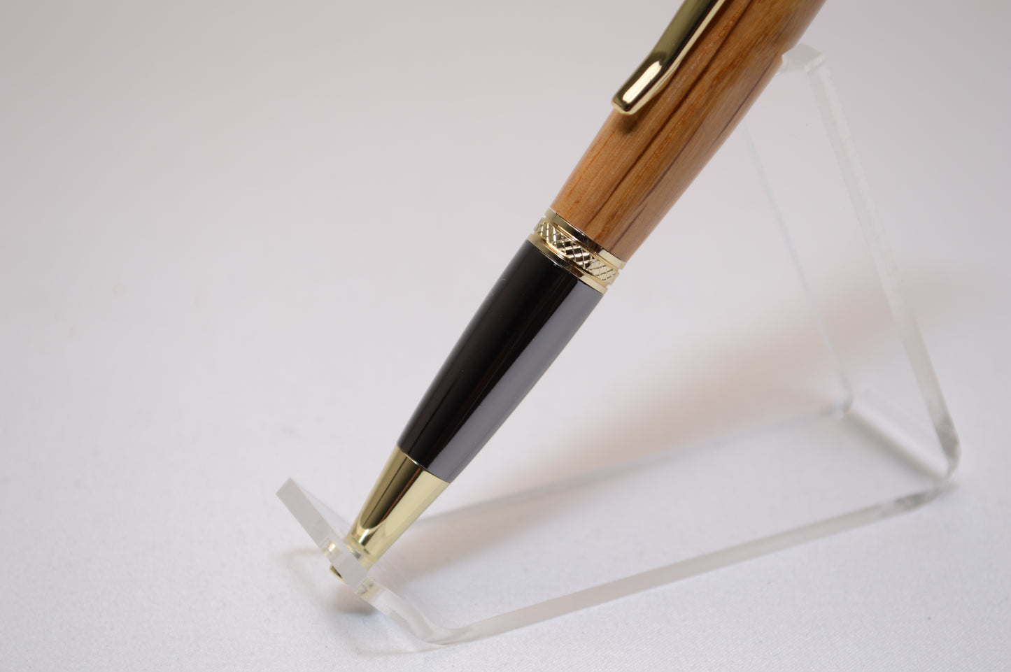 Whiskey Barrel Twist Pen in Gold and Black Titanium Finish with Velvet Pouch.