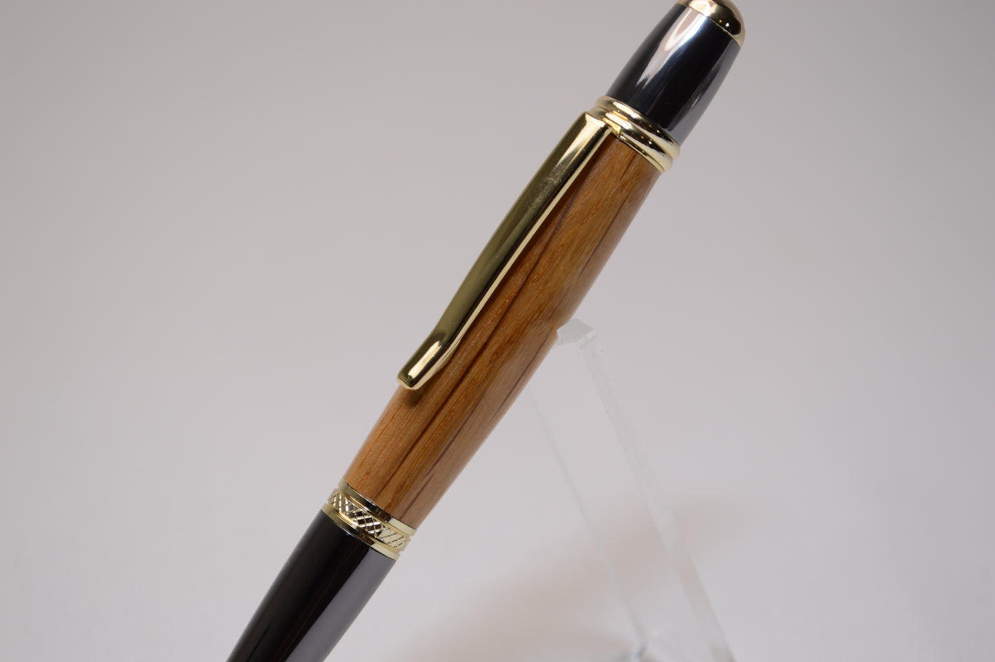 Whiskey Barrel Twist Pen in Gold and Black Titanium Finish with Velvet Pouch.