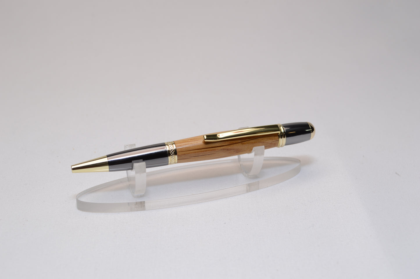 Whiskey Barrel Twist Pen in Gold and Black Titanium Finish with Velvet Pouch.