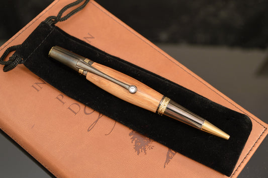 Whiskey Barrel Majestic Squire Twist Pen in Black Titanium and Gold Titanium with Swarovski Crystal.